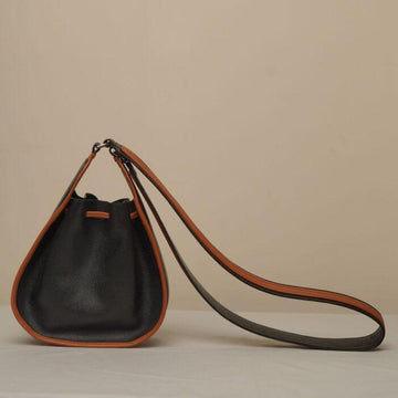 Curl Batua Sling - Black & Tan