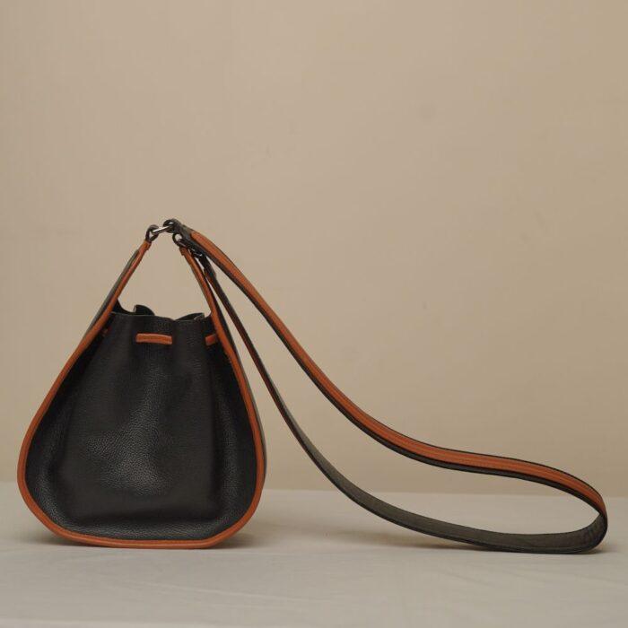 Curl Batua Sling - Black & Tan