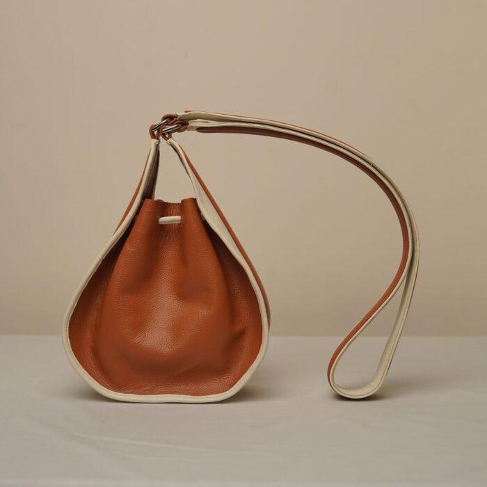 Curl Batua Sling - Cream & Tan