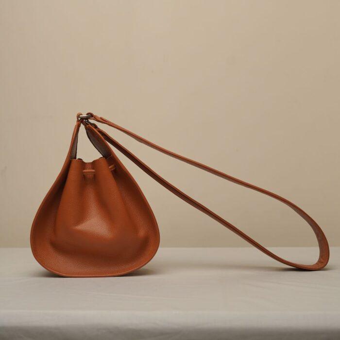 Curl Batua Sling - Tan